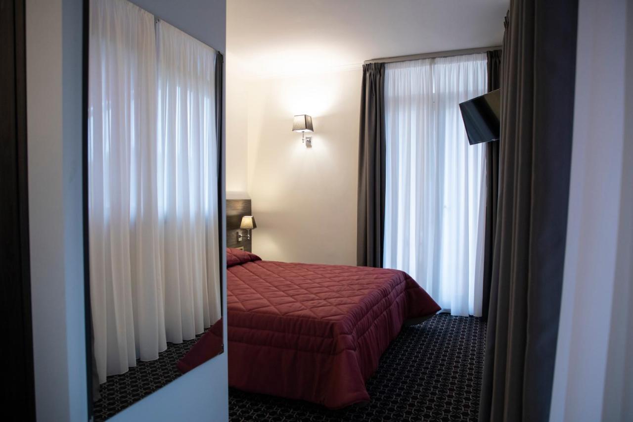 Gemelli Hotel Roma Esterno foto