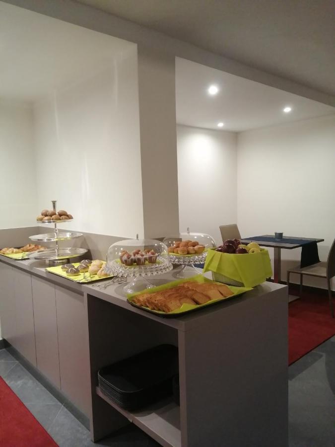 Gemelli Hotel Roma Esterno foto