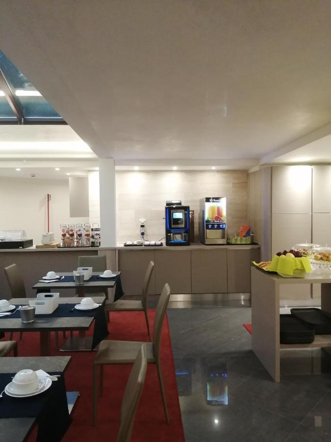 Gemelli Hotel Roma Esterno foto